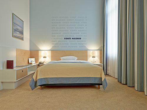 Doppelbett im Classic-Zimmer im Hotel Navigare 